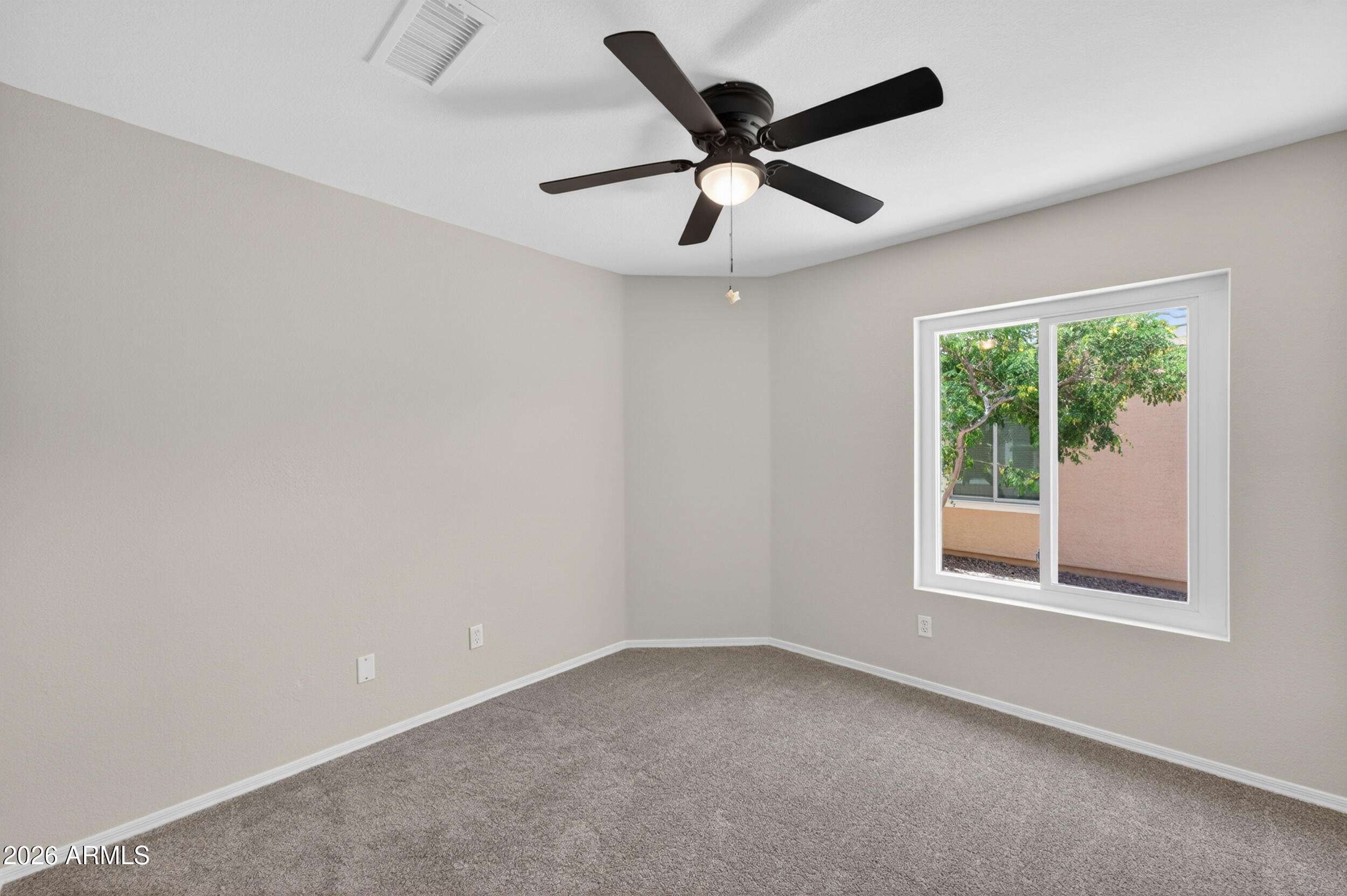 4729 West Monterey Street Chandler, AZ 85226 - Photo 6 of 50 an empty room with a window