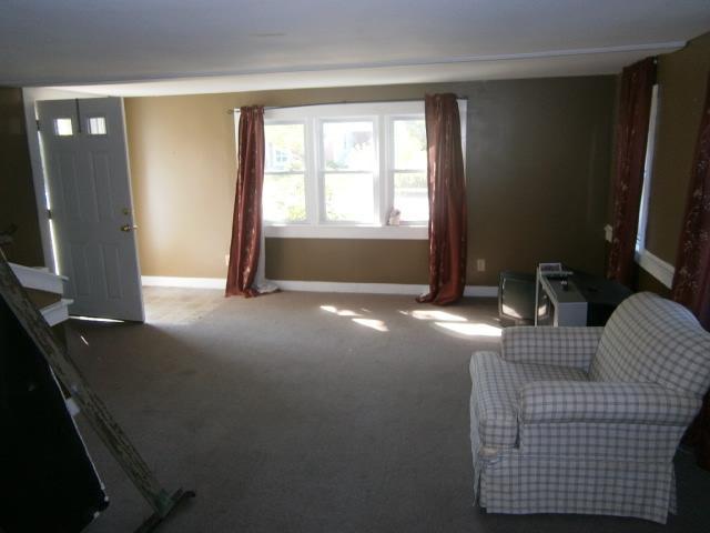 22 Brookshire Road Hyannis, MA 02601 - Photo 5 of 10 a living room with furniture window and a flat screen tv