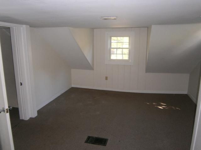 22 Brookshire Road Hyannis, MA 02601 - Photo 7 of 10 an empty room with windows