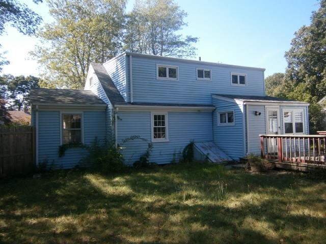 22 Brookshire Road Hyannis, MA 02601 - Photo 10 of 10 a view of a house with a yard plants and large tree