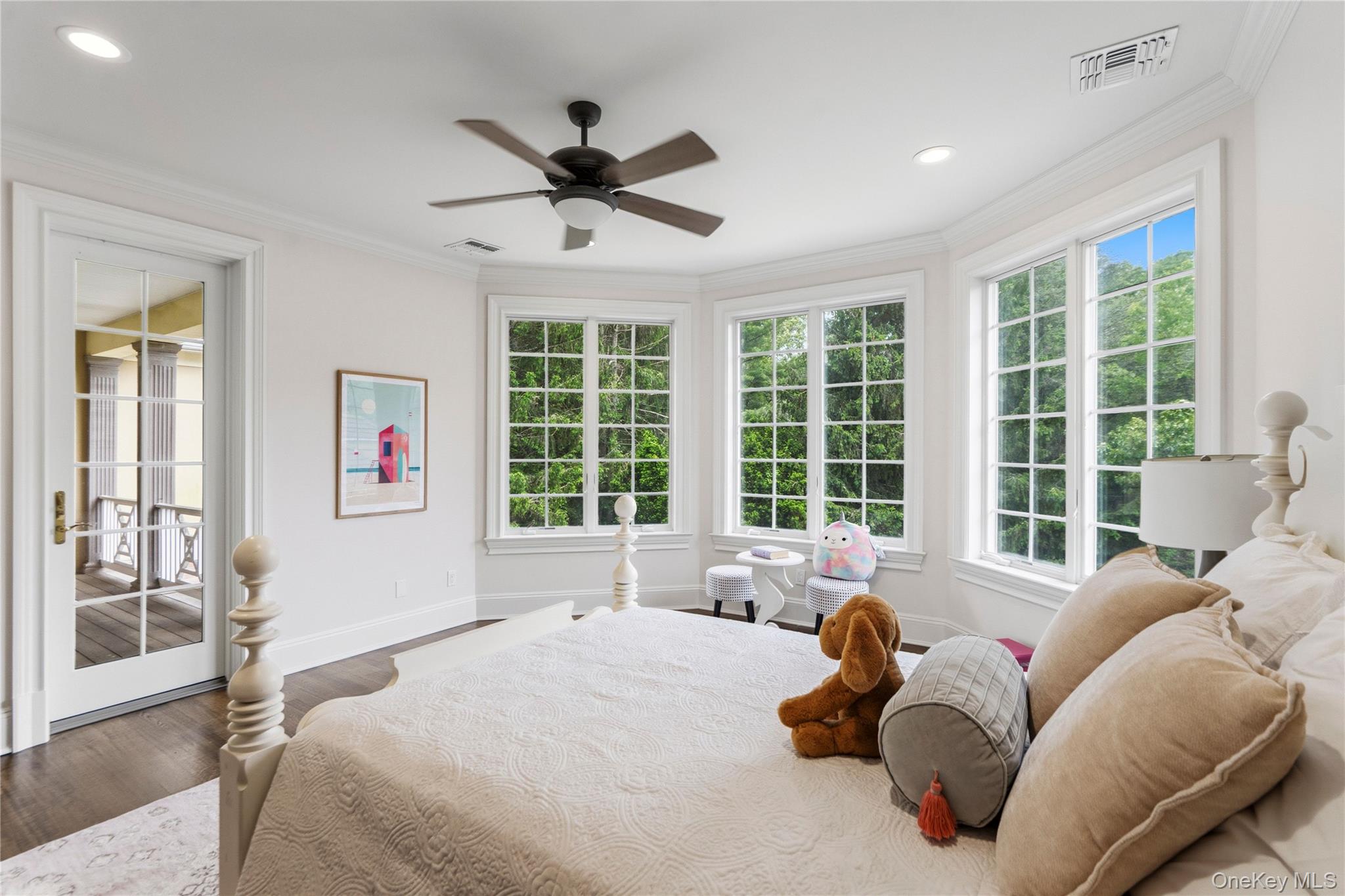 1960 Midlane Road South Syosset, NY 11791 - Photo 42 of 46 a bed room with a bed and a large window