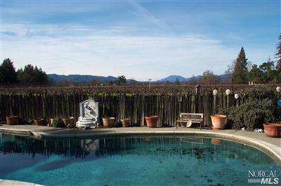 1090 Rutherford Road Rutherford, CA 94558 - Photo 9 of 10 a view of house with outdoor space and sitting area