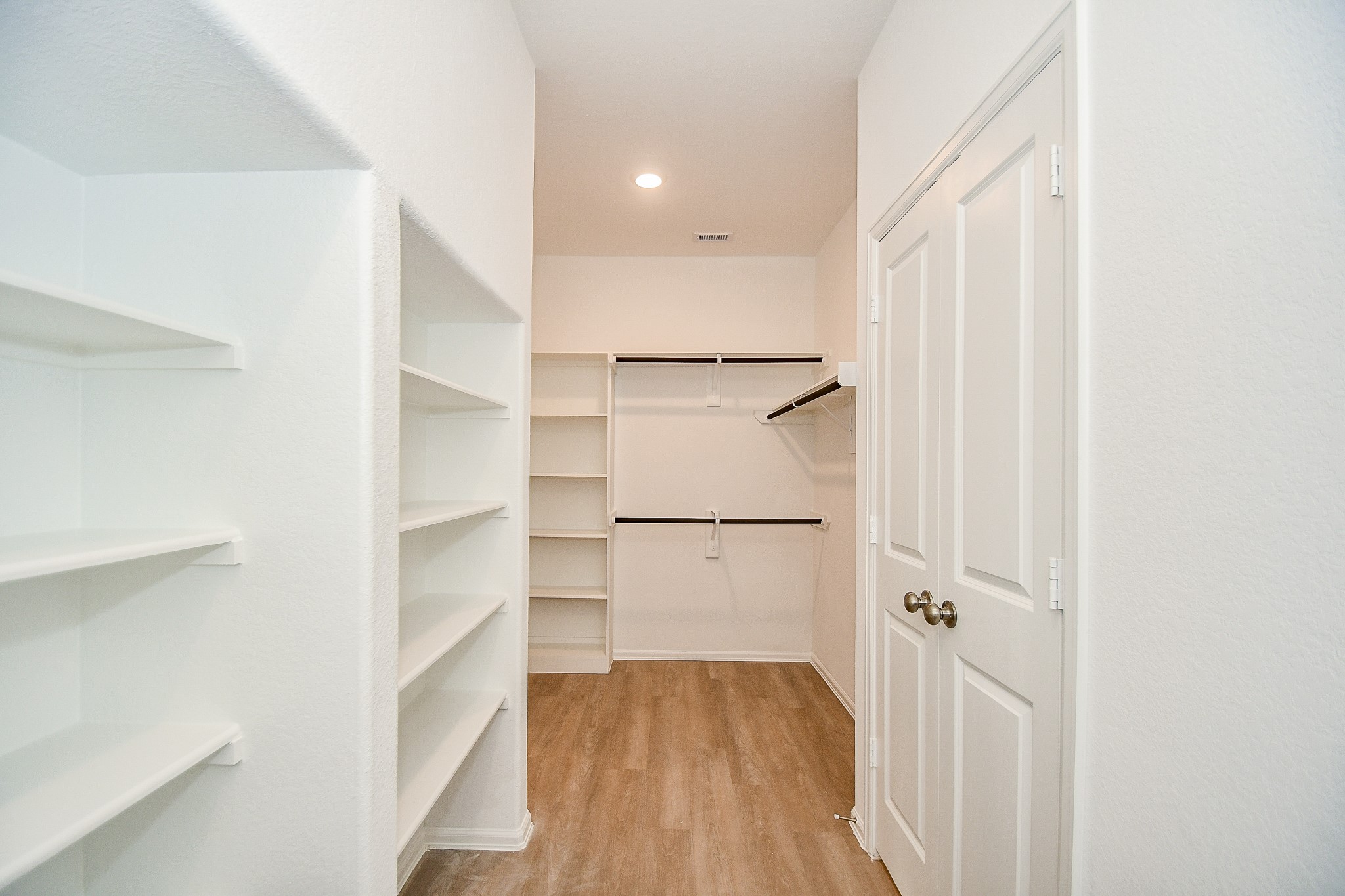 5240 Pine Pass Drive Rosenberg, TX 77469 - Photo 29 of 32 a view of walk in closet with empty racks