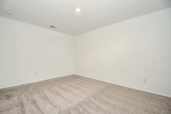 a view of a room that has a window in it