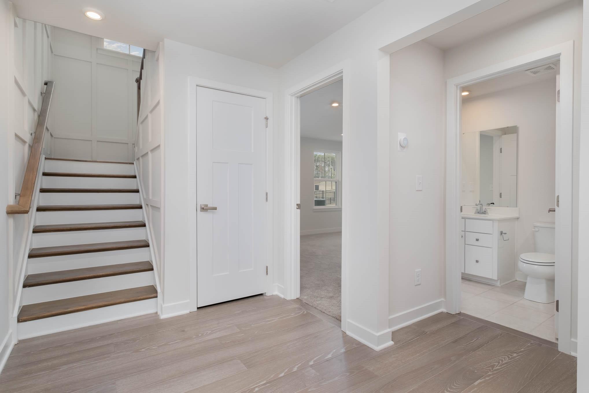 659 Crudent Road Tega Cay, SC 29708 - Photo 4 of 30 a view of entryway with white walls and wooden floor