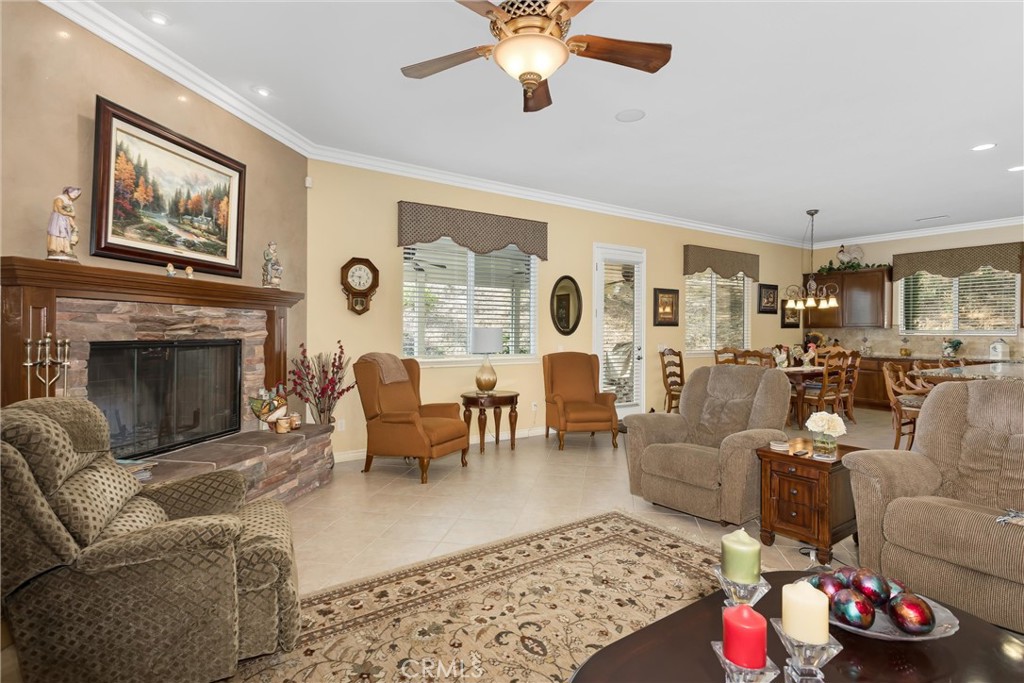 9841 Kehl Canyon Road Beaumont, CA 92223 - Photo 22 of 57 a living room with furniture fireplace and window