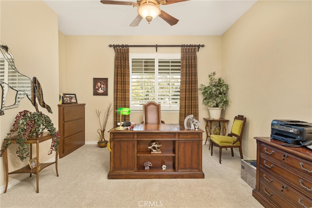 9841 Kehl Canyon Road Beaumont, CA 92223 - Photo 24 of 57 a view of a workspace with furniture