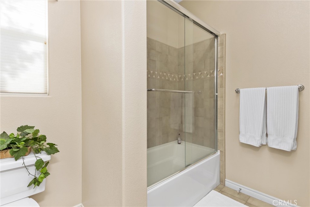 9841 Kehl Canyon Road Beaumont, CA 92223 - Photo 29 of 57 a bathroom with a tub and shower