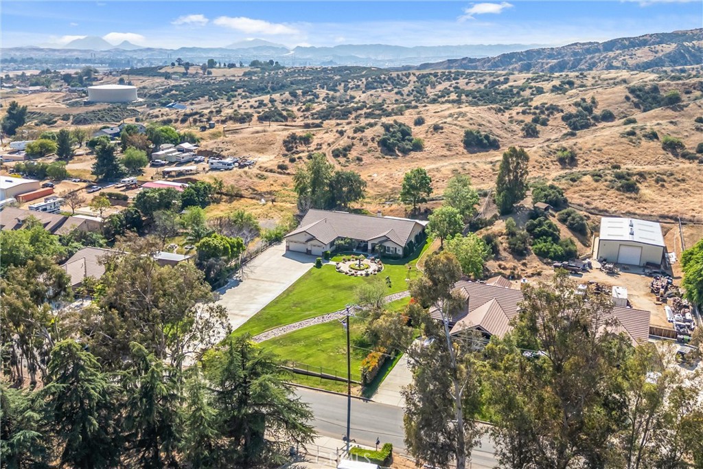 9841 Kehl Canyon Road Beaumont, CA 92223 - Photo 49 of 57 an aerial view of residential houses with outdoor space