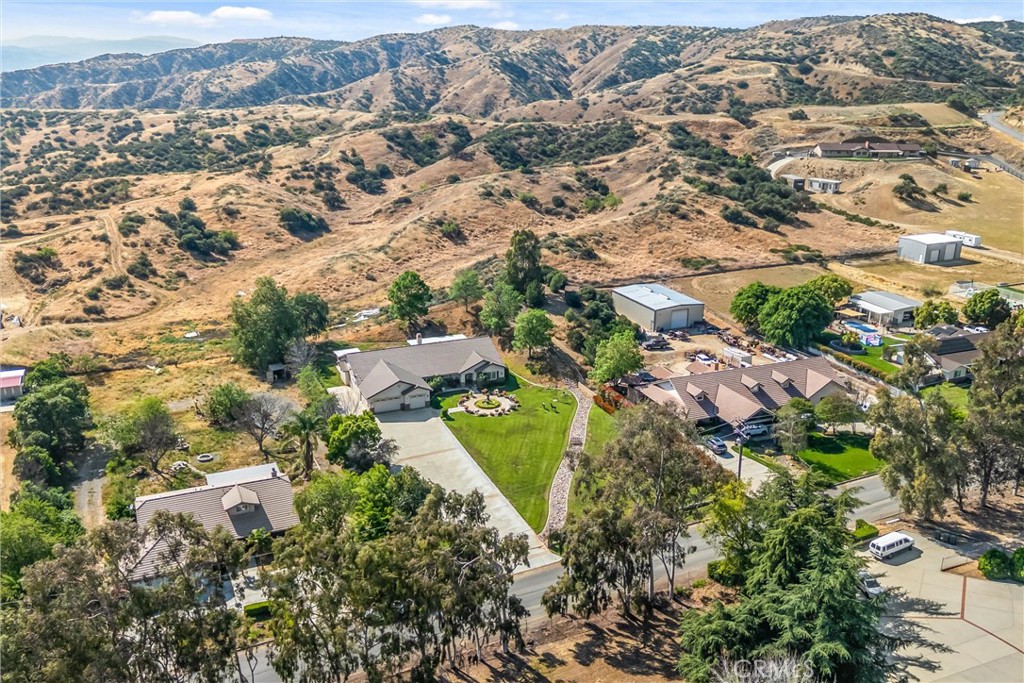 9841 Kehl Canyon Road Beaumont, CA 92223 - Photo 51 of 57 an aerial view of residential house with outdoor space