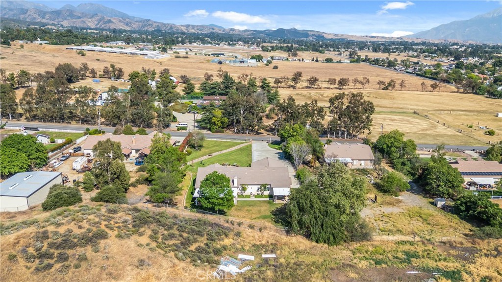 9841 Kehl Canyon Road Beaumont, CA 92223 - Photo 54 of 57 an aerial view of residential houses with outdoor space and river