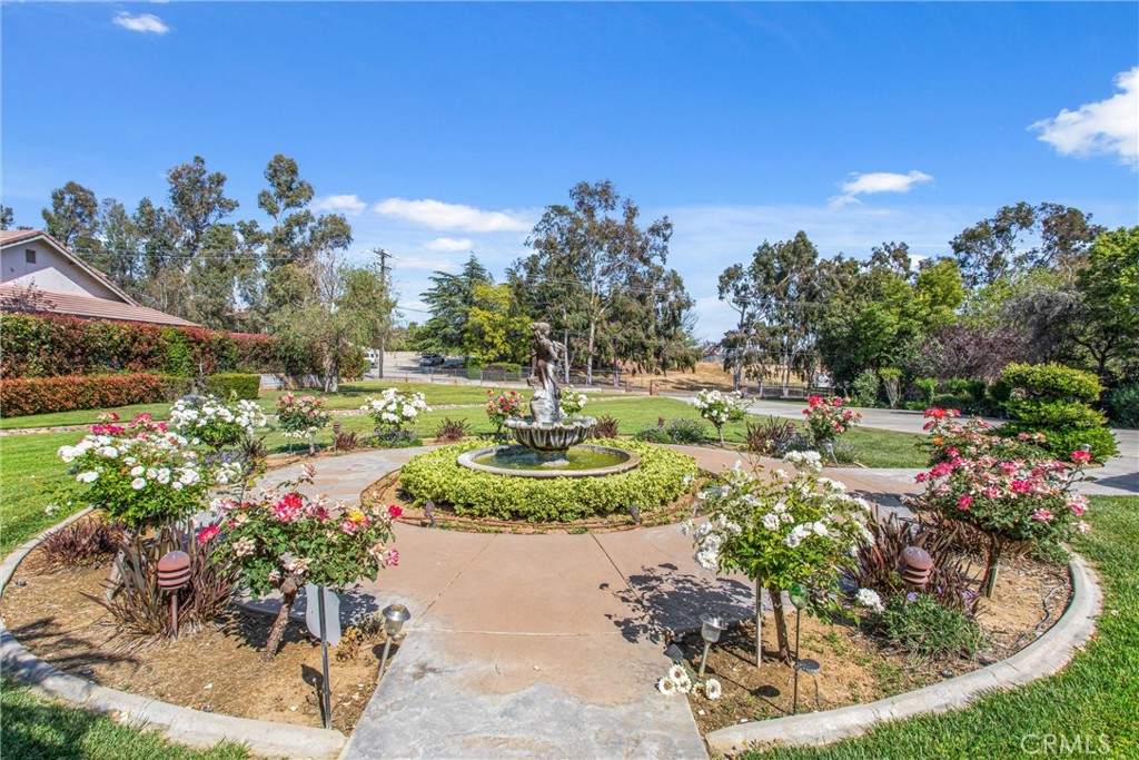 9841 Kehl Canyon Road Beaumont, CA 92223 - Photo 9 of 57 a view of a garden with a fountain