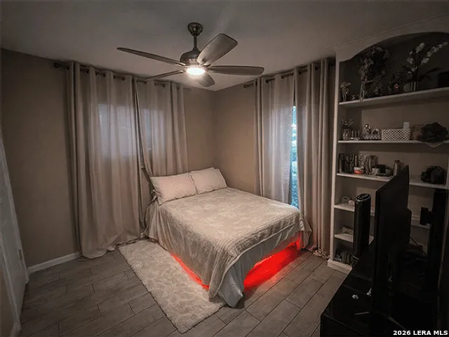 a bedroom with a bed and a walk in closet
