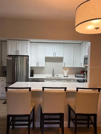 $2,000 | 1225 Pine Ridge Circle West, Unit C1, Tarpon Springs, FL 34688