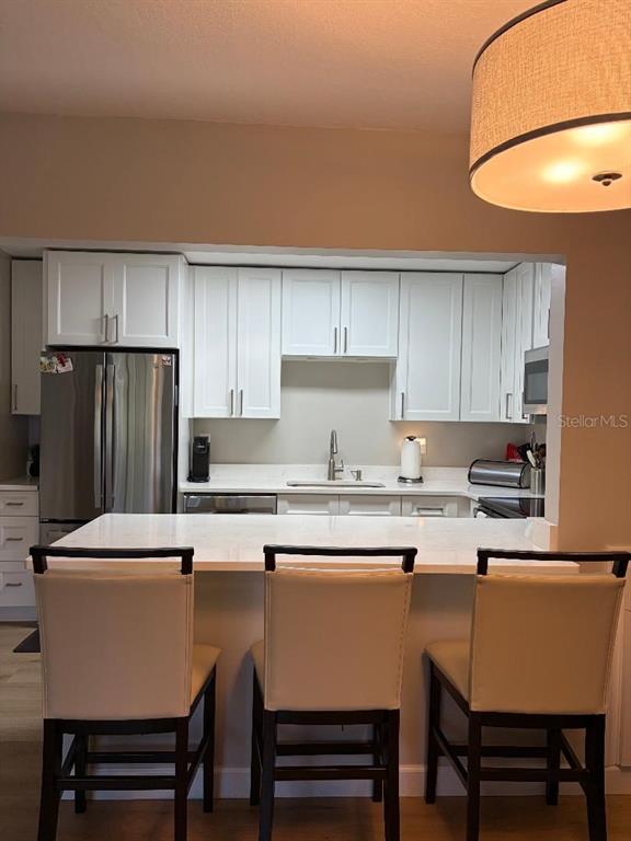 1225 Pine Ridge Circle West, Unit C1 Tarpon Springs, FL 34688 - Photo 4 of 17