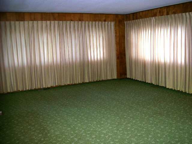 1 Rr Weldon, IL 61882 - Photo 2 of 4 an empty room with wooden floor and windows