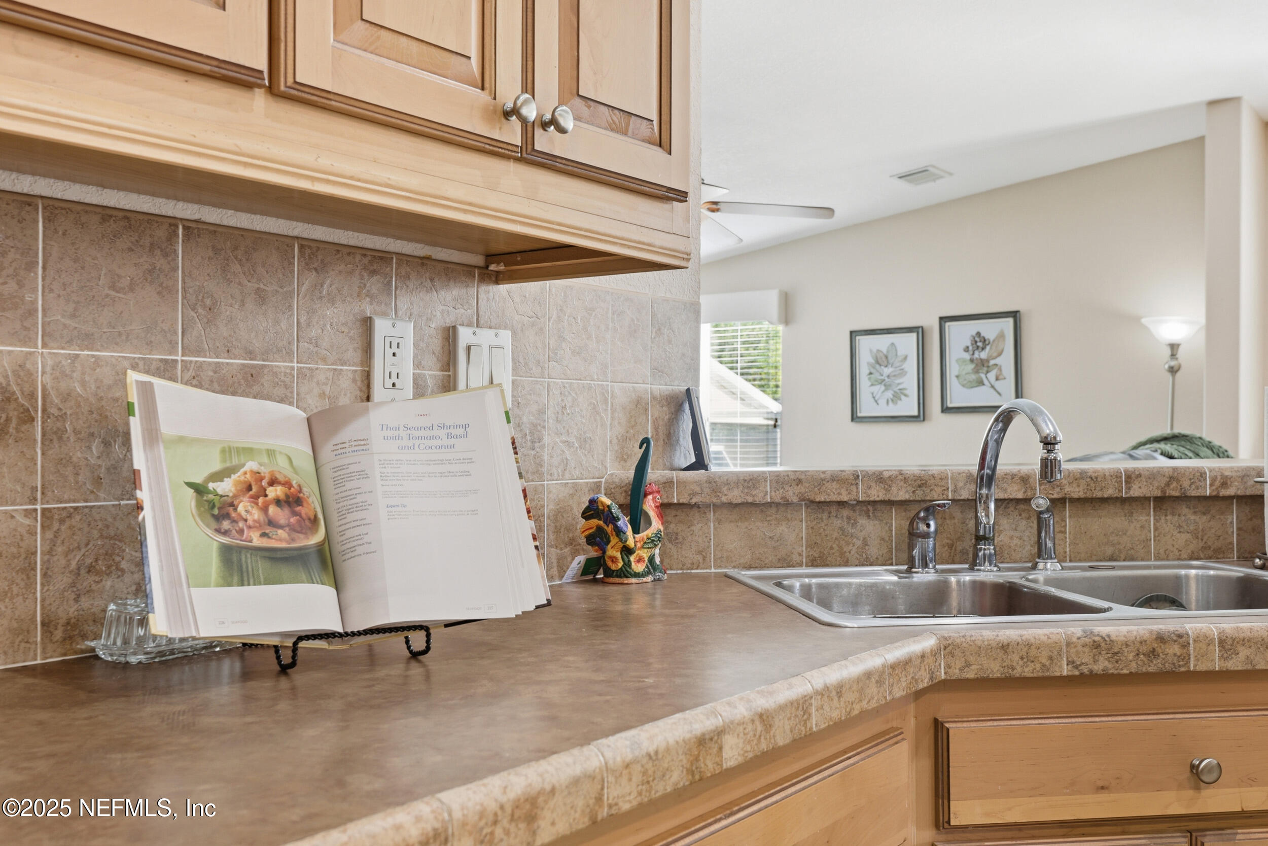 112 Waterside Avenue Satsuma, FL 32189 - Photo 16 of 52 a kitchen with a sink and a wooden floor