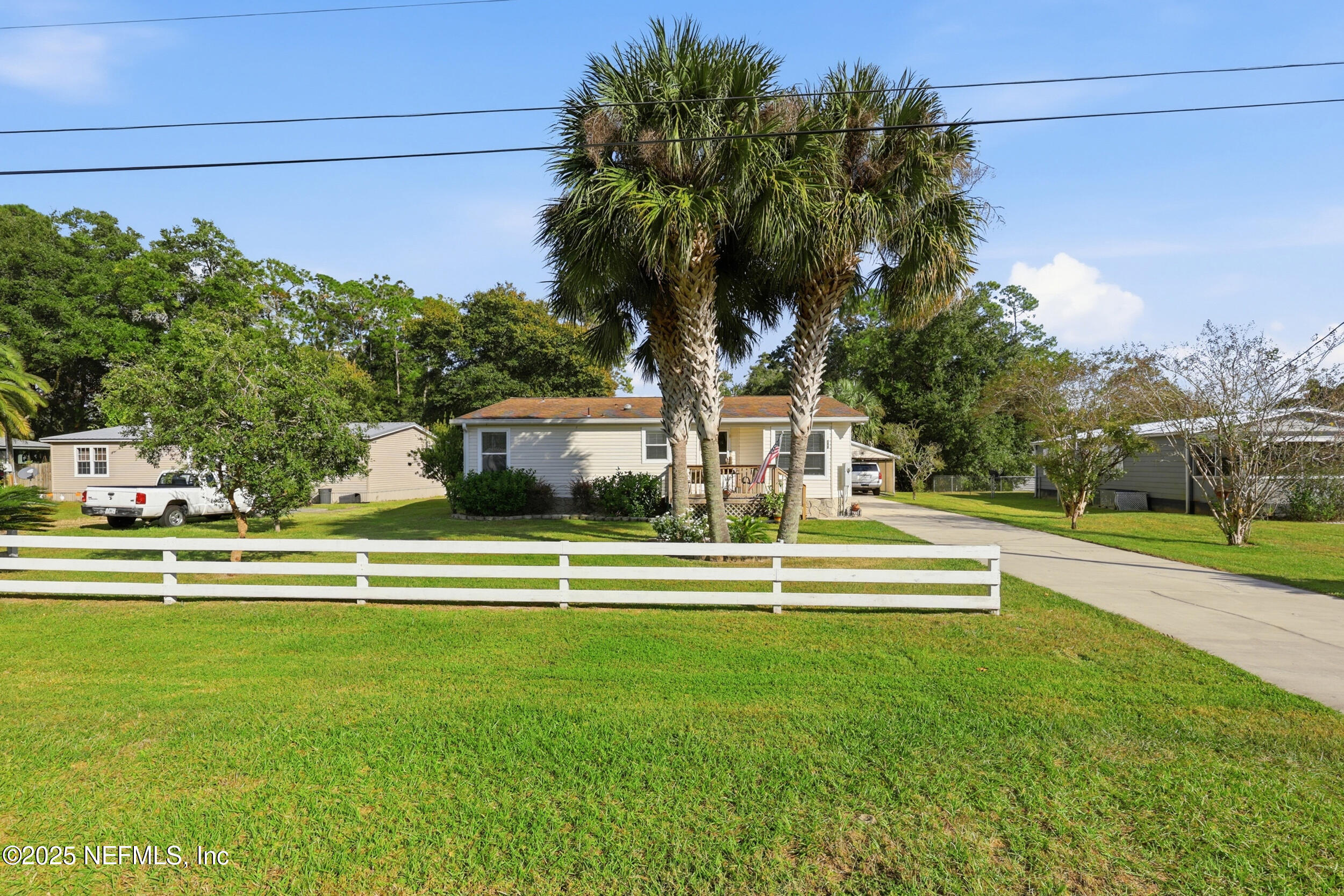 112 Waterside Avenue Satsuma, FL 32189 - Photo 2 of 52 a view of a fountain in front of a house