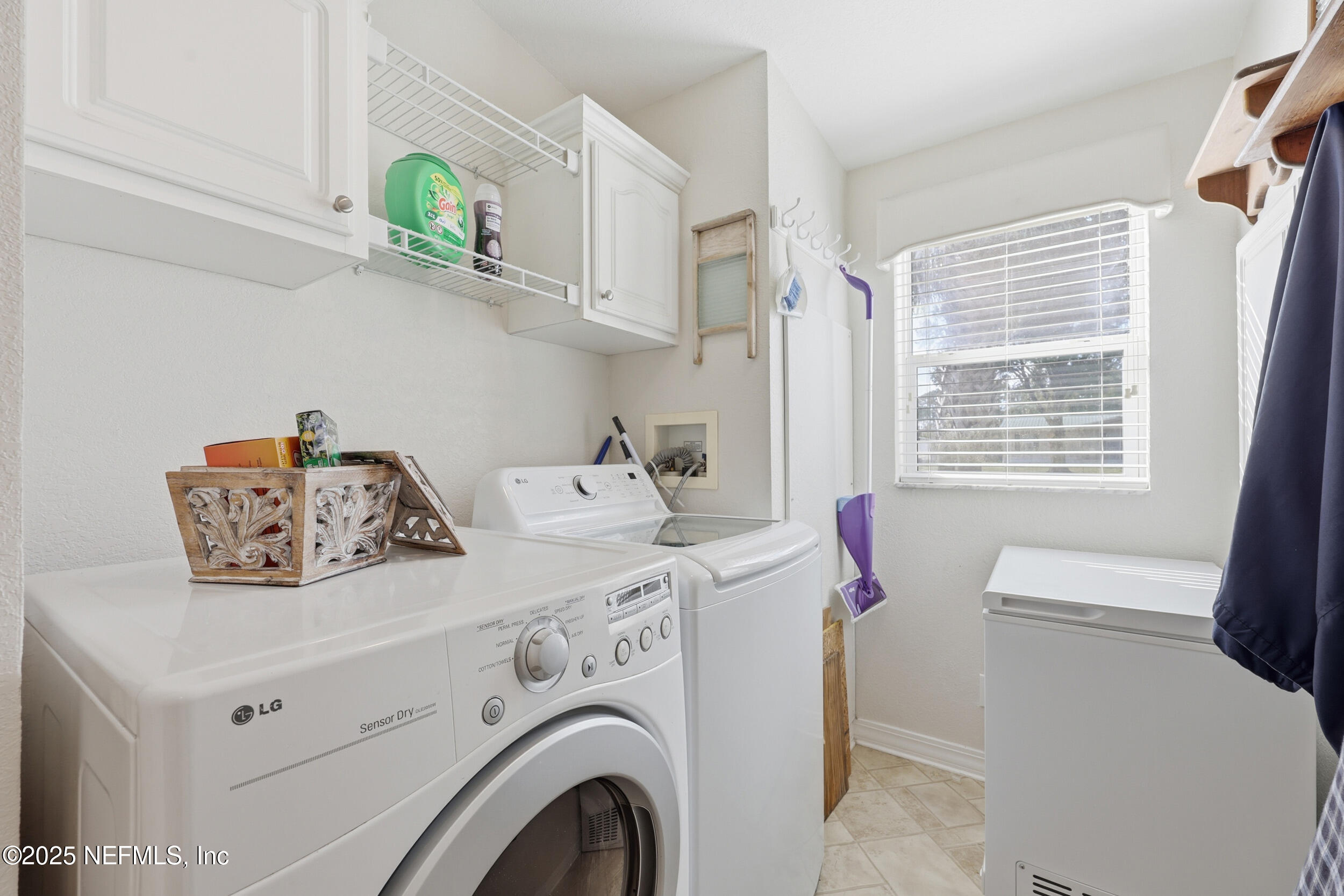 112 Waterside Avenue Satsuma, FL 32189 - Photo 30 of 52 a utility room with dryer and washer