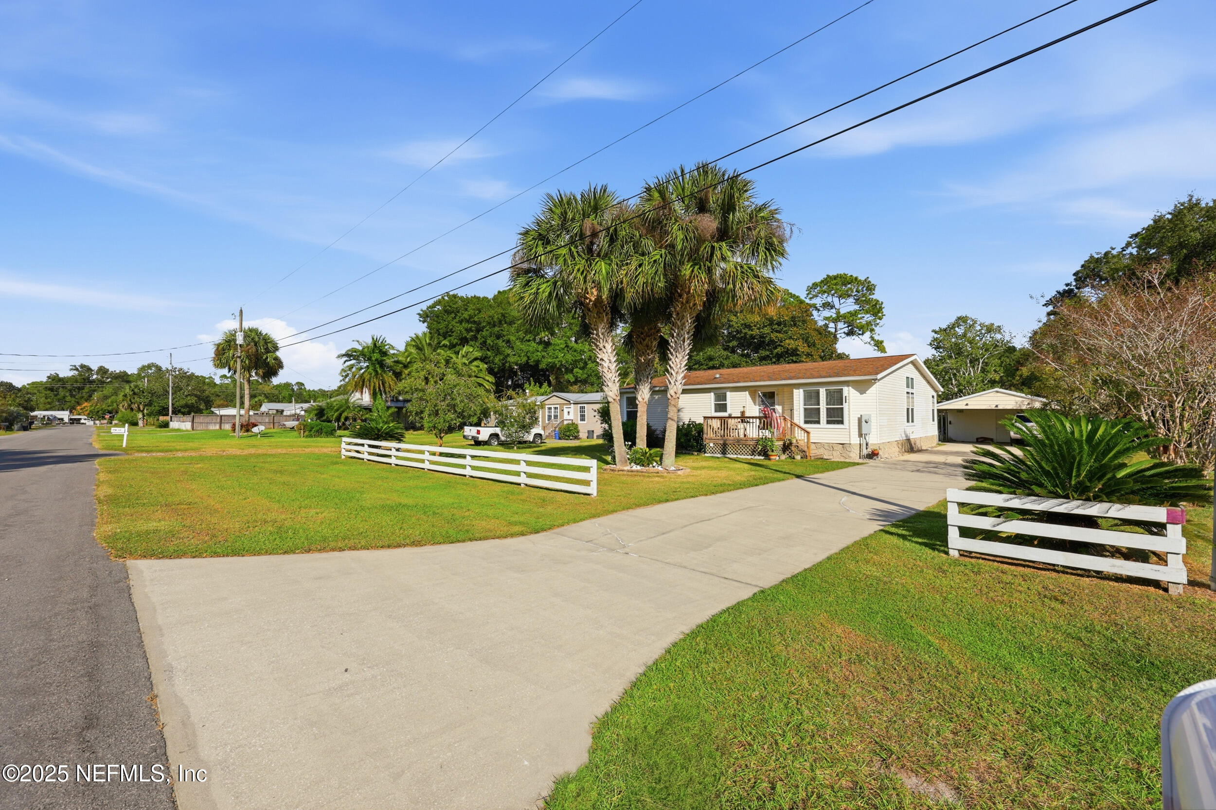 112 Waterside Avenue Satsuma, FL 32189 - Photo 3 of 52 a view of a house with a swimming pool
