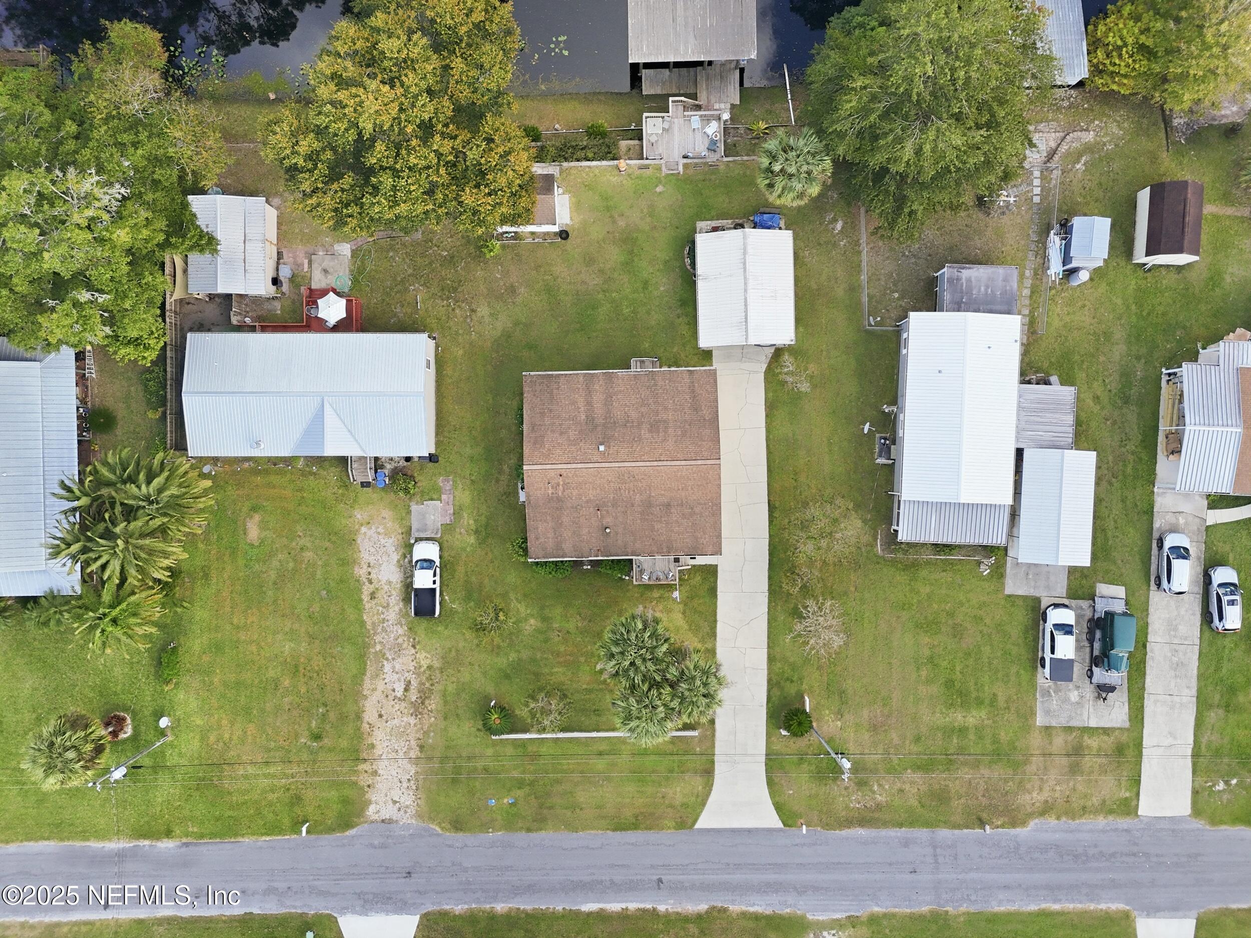 112 Waterside Avenue Satsuma, FL 32189 - Photo 51 of 52 an aerial view of residential houses with outdoor space