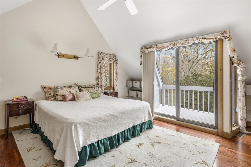 94 Howland Road Westport, MA 02790 - Photo 30 of 33 a bedroom with a bed and a large window