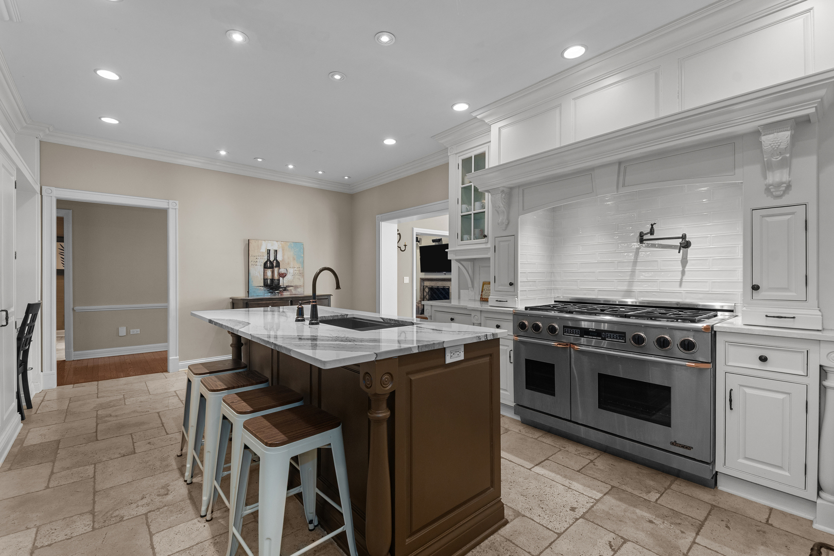720 Newcastle Drive Lake Forest, IL 60045 - Photo 15 of 42 a kitchen with a stove sink and cabinets