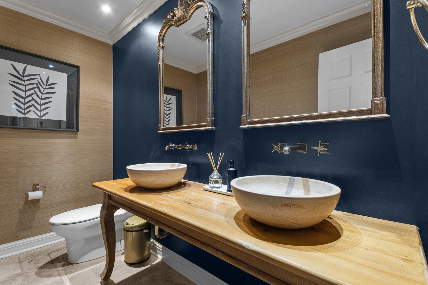 720 Newcastle Drive Lake Forest, IL 60045 - Photo 18 of 42 a bathroom with a toilet sink and mirror