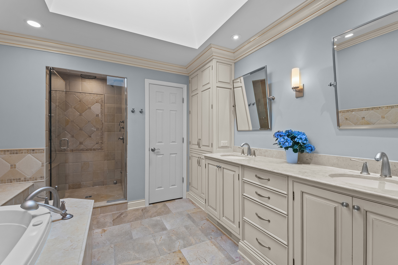 720 Newcastle Drive Lake Forest, IL 60045 - Photo 29 of 42 a bathroom with a double vanity sink mirror and shower