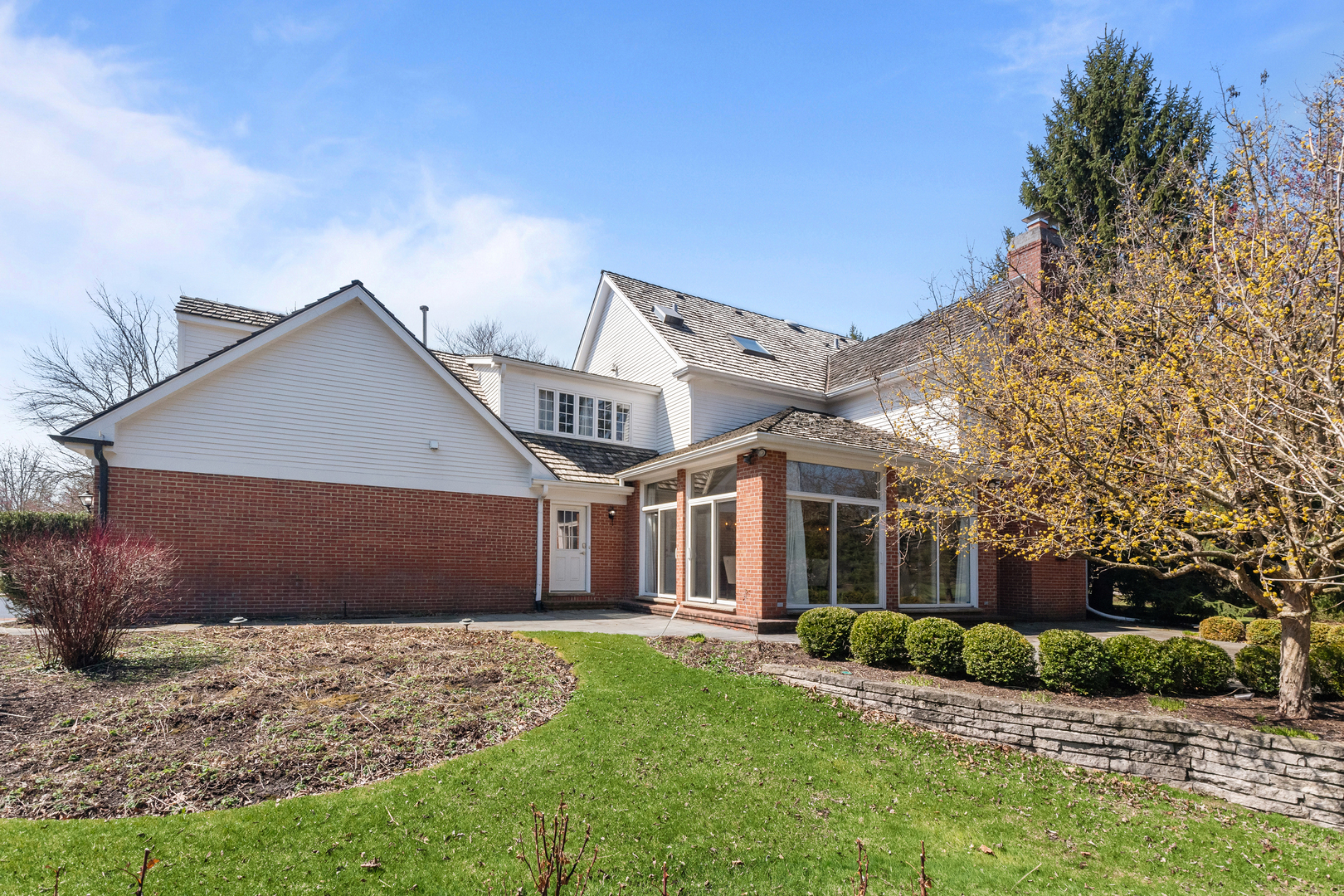 720 Newcastle Drive Lake Forest, IL 60045 - Photo 37 of 42 a view of a house with a yard and large tree