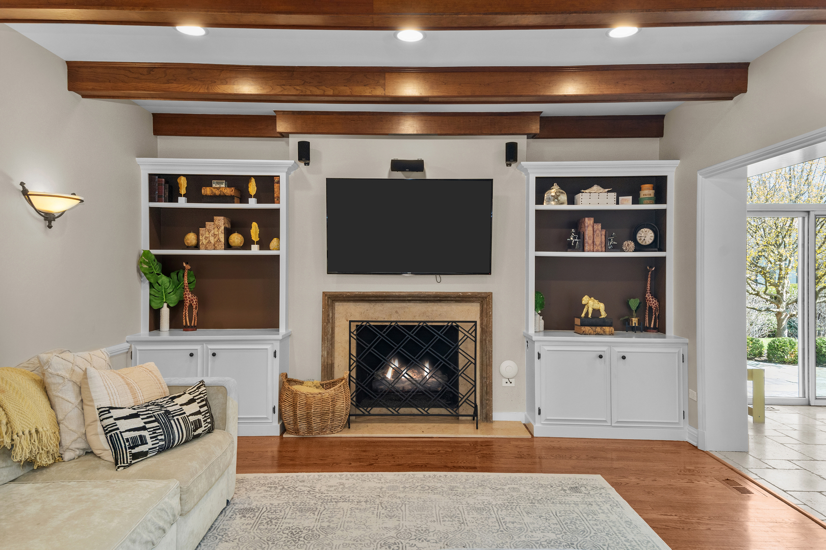 720 Newcastle Drive Lake Forest, IL 60045 - Photo 8 of 42 a living room with furniture a fireplace and a rug