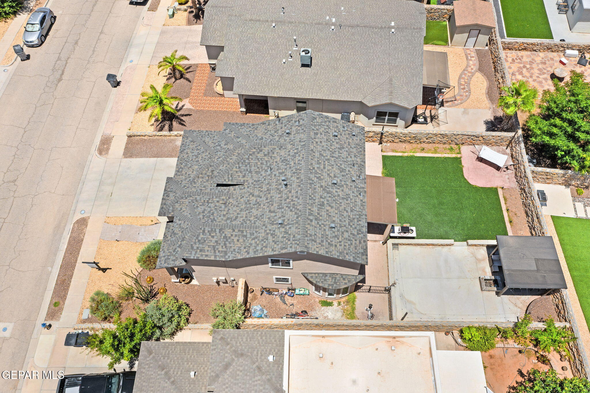 3152 Rustic Hidden Drive El Paso, TX 79938 - Photo 37 of 38 an aerial view of a house with a swimming pool
