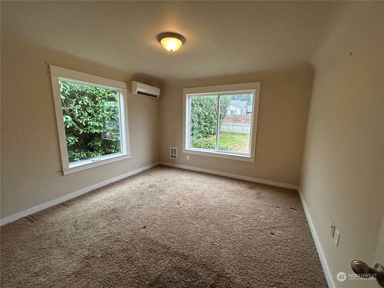 6919 Cady Road Everett, WA 98203 - Photo 17 of 29 an empty room with windows