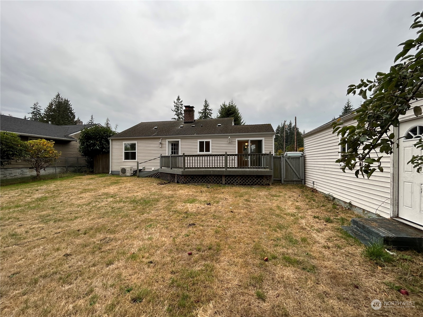 6919 Cady Road Everett, WA 98203 - Photo 25 of 29 a view of a house with a yard