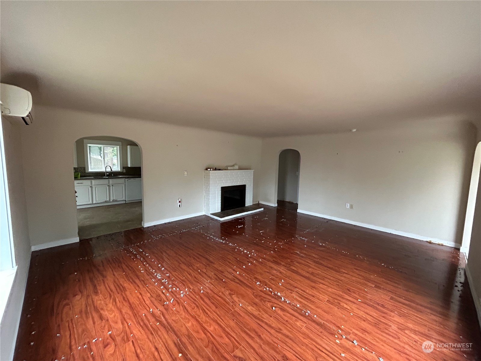 6919 Cady Road Everett, WA 98203 - Photo 4 of 29 a bedroom with a bed and wooden floor