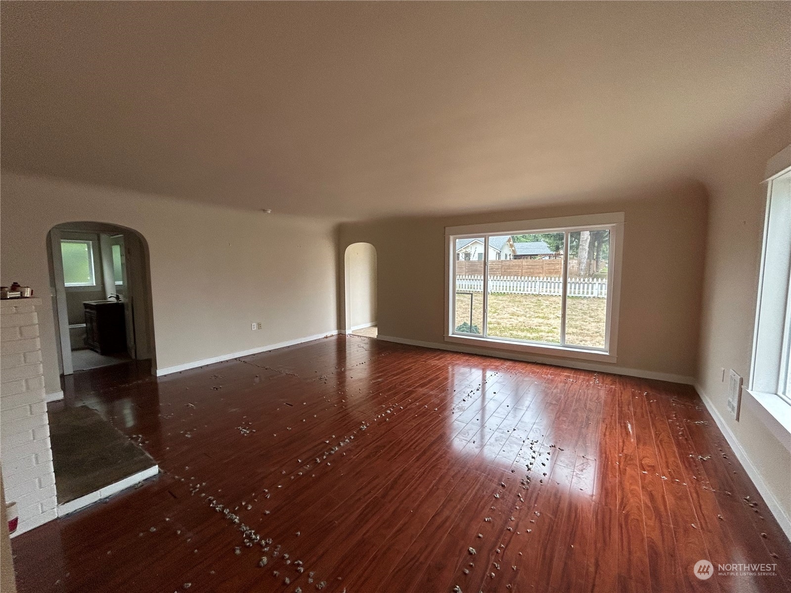 6919 Cady Road Everett, WA 98203 - Photo 5 of 29 wooden floor in an empty room with a window