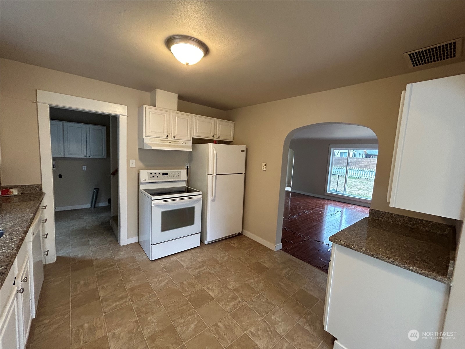 6919 Cady Road Everett, WA 98203 - Photo 8 of 29 a kitchen with a refrigerator and a sink