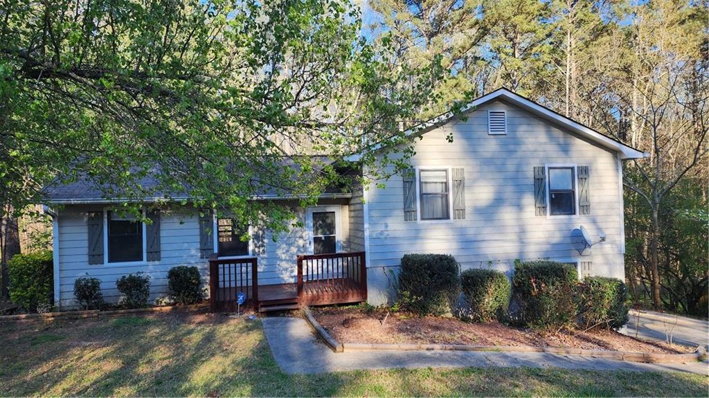 1229 Dallas Nebo Road Dallas, GA 30157 - Photo 1 of 1 front view of a house with a yard