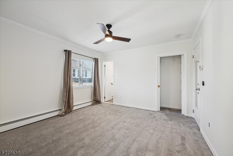 175 Chestnut Street, Unit B Boonton, NJ 07005 - Photo 21 of 30 a view of an empty room with a window