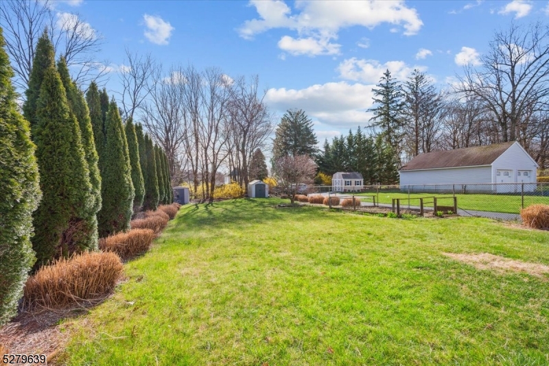 175 Chestnut Street, Unit B Boonton, NJ 07005 - Photo 27 of 30 a view of yard with swimming pool and green space