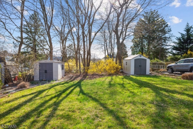 175 Chestnut Street, Unit B Boonton, NJ 07005 - Photo 29 of 30 a backyard of a house with a garden and plants