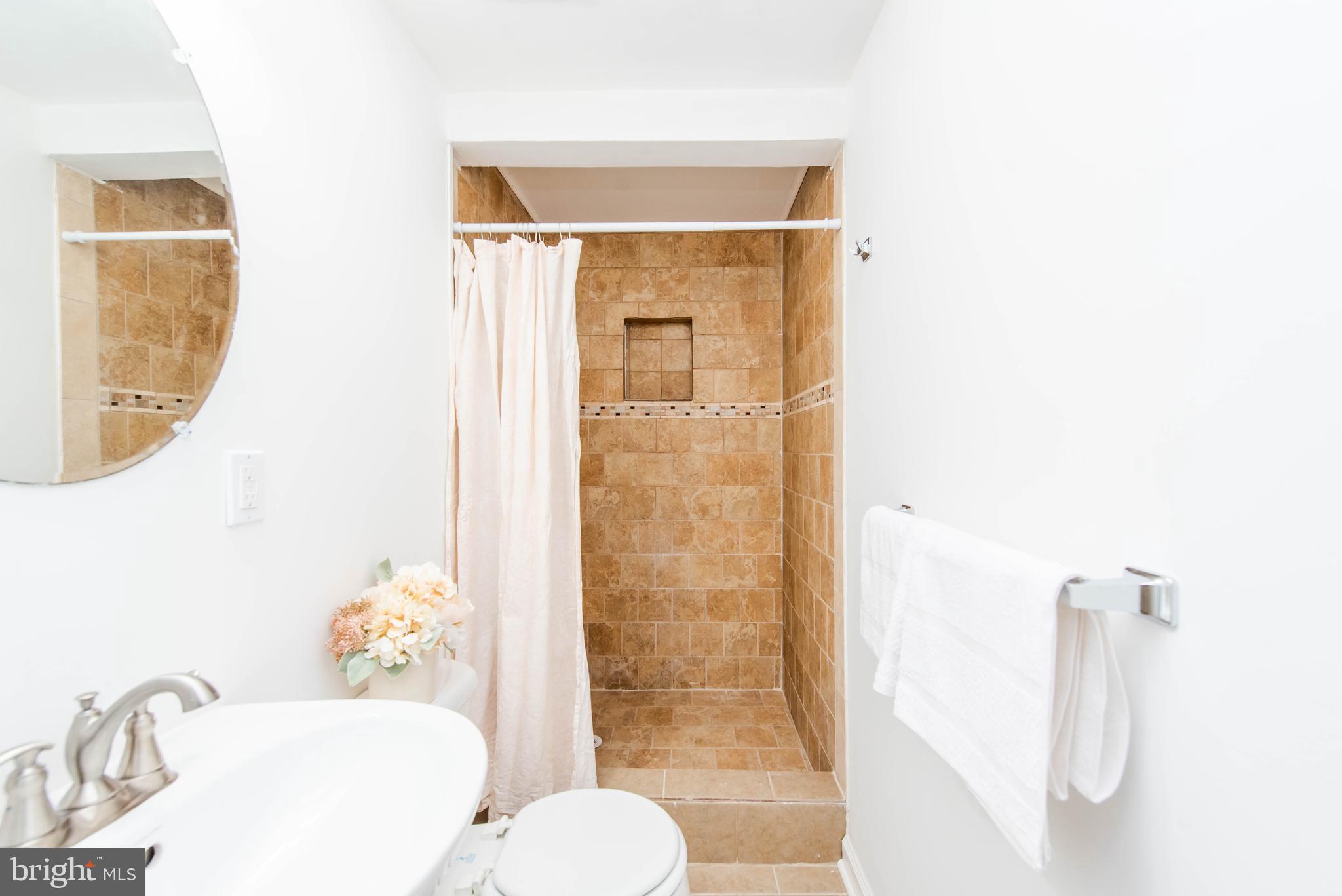 929 Prestwood Road Baltimore, MD 21228 - Photo 32 of 37 Lower level full bathroom