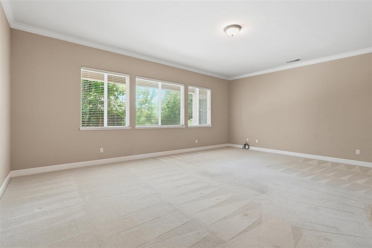 4129 Poppleton Way Carmichael, CA 95608 - Photo 6 of 48 an empty room with a window