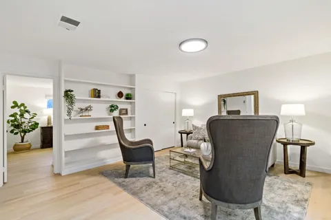 a view of a livingroom with furniture and a couch