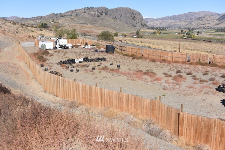 30007 Highway 97 Riverside, WA 98849 - Photo 12 of 31 a view of a backyard with wooden fence
