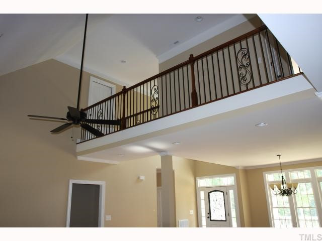 3436 Griffice Mill Road Raleigh, NC 27610 - Photo 3 of 10 Second floor catwalk overlooks family room and kitchen