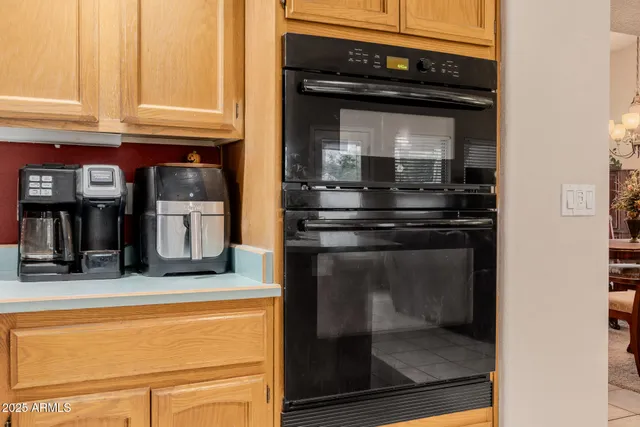 a view of a chair and table of the garden