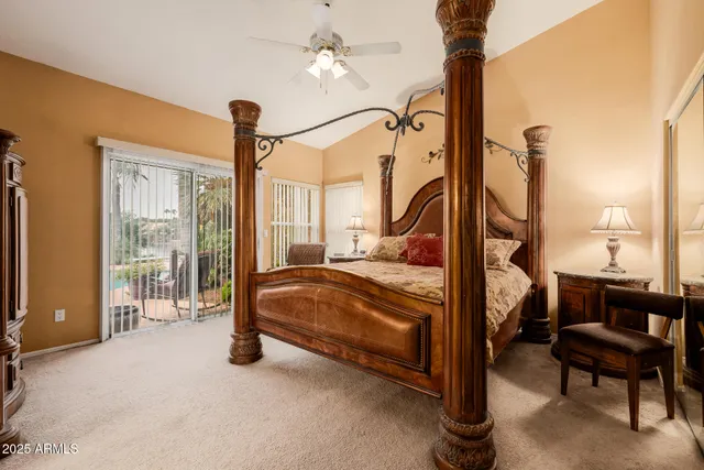 a view of swimming pool with outdoor seating and lake view