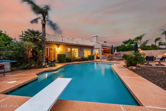 an aerial view of a house with a garden