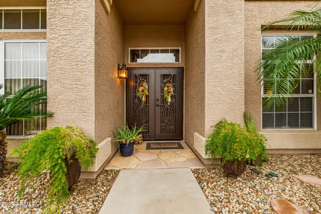 a view of swimming pool with a patio